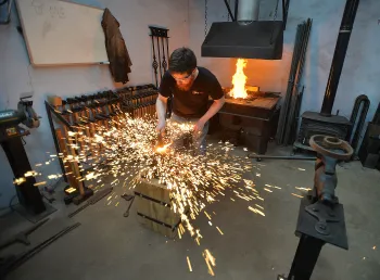 A trainee craftsperson at work