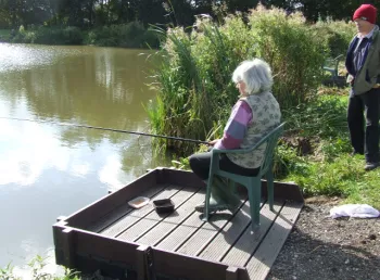 Woman fishing in the Trent Vale