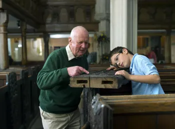 Volunteers worked with the local school children to learn about woodcarving.