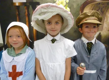Children in First World War costumes at The Museum of Somerset