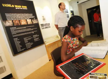 A young participant learning about the First World War