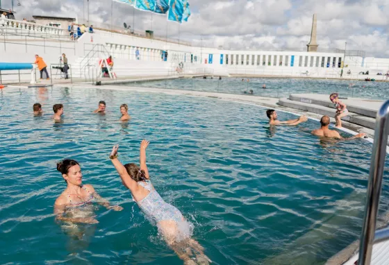 People swimming and playing in the Jubilee Pool