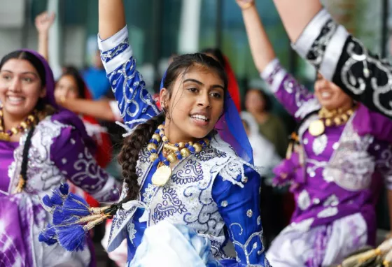 People dancing as part of a cultural festival at the Birmingham Commonwealth games