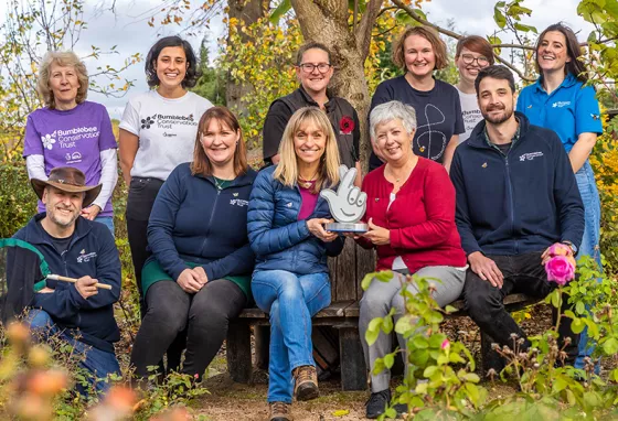 Bumblebee champions win National Lottery Project of the Year Award Smiling group of volunteers