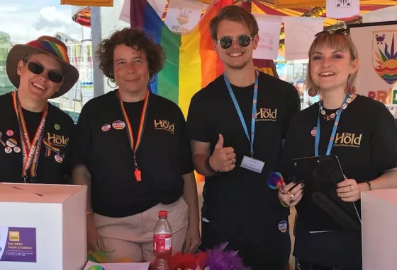The Hold volunteers at Suffolk Pride The Hold volunteers at their stand at Suffolk Pride