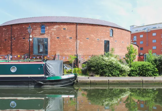 Roundhouse Birmingham – an innovative blend of historical discovery, outdoor activities and urban enterprise Round building with canal in foreground