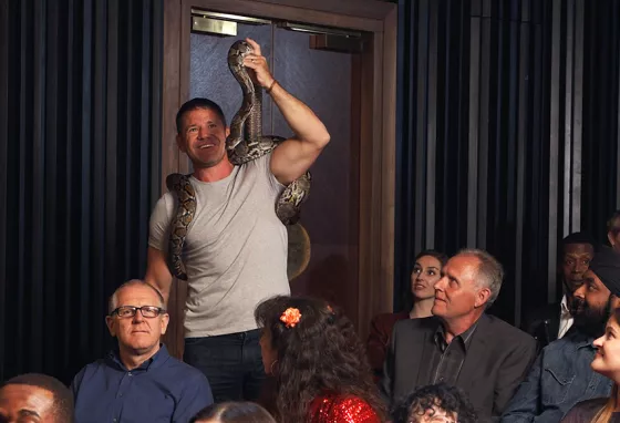 25 years: what has The National Lottery ever done for us? Steve Backshall holding a snake