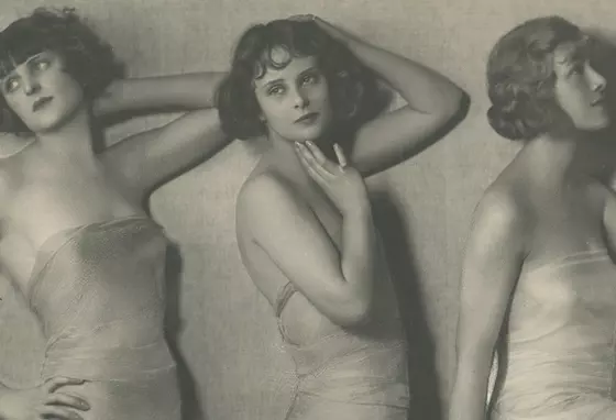Black and white studio photo from 1923 of three women posing in a 'frieze'