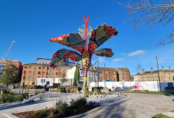 Hibiscus Rising sculpture A colourful sculpture of an hibiscus flower