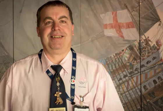 Changing lives: Mary Rose volunteering helps Neil recover Young man in shirt and tie