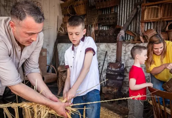 Children and adults take part in traditional heritage crafts