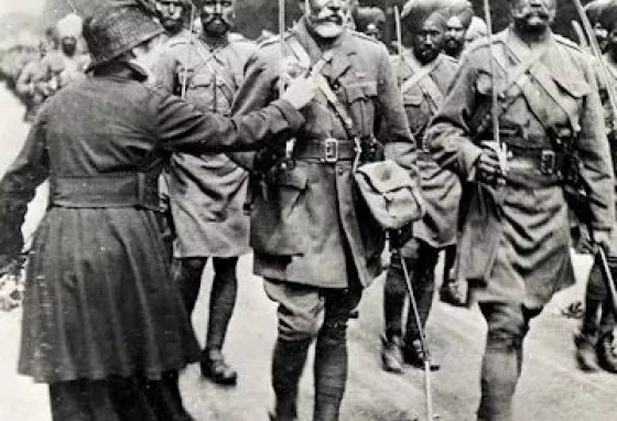 A lady pinning a flower onto a Sikh soldier in 1916 A lady pinning a flower onto a Sikh soldier in 1916