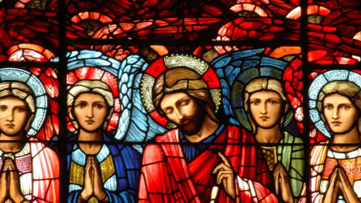 Detail from a Burne-Jones stained glass window at Birmingham Cathedral showing figures