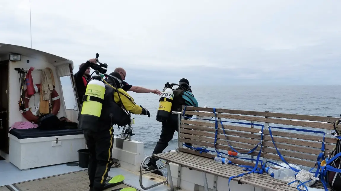 Changing lives: Linda pays tribute to great grandfather Members of the dive team prepare to enter the water above the wreck