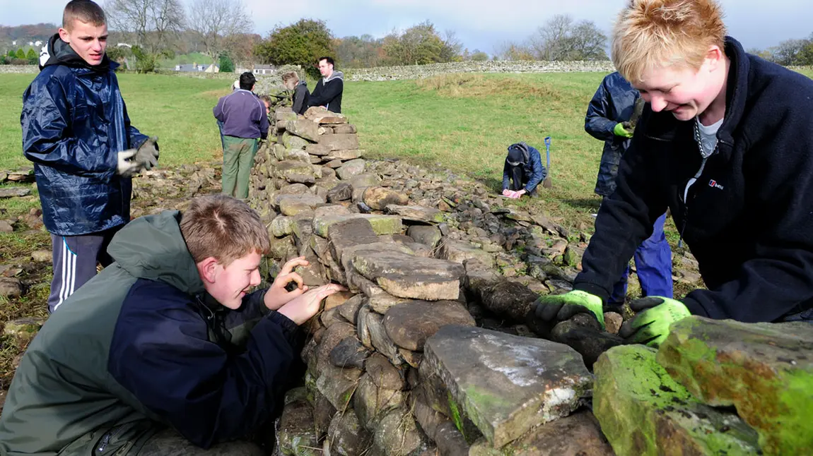 Participants learn dry stone walling on an HLF-supported Heritage Grants project