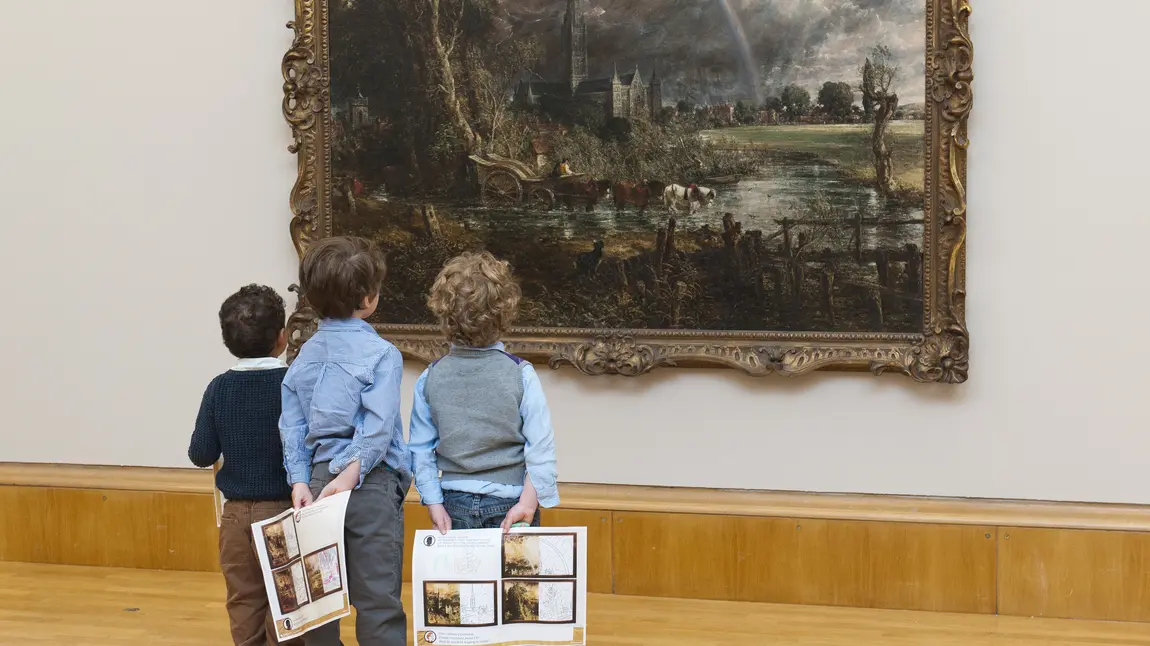 Viewers admiring Constable's painting 'Salisbury Cathedral from the Meadows'