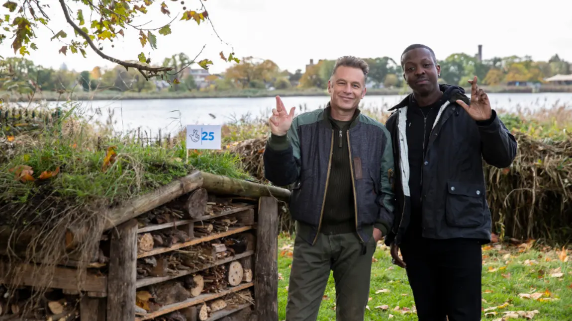 Chris Packham and Jamal Edwards crossing their fingers like the National Lottery logo