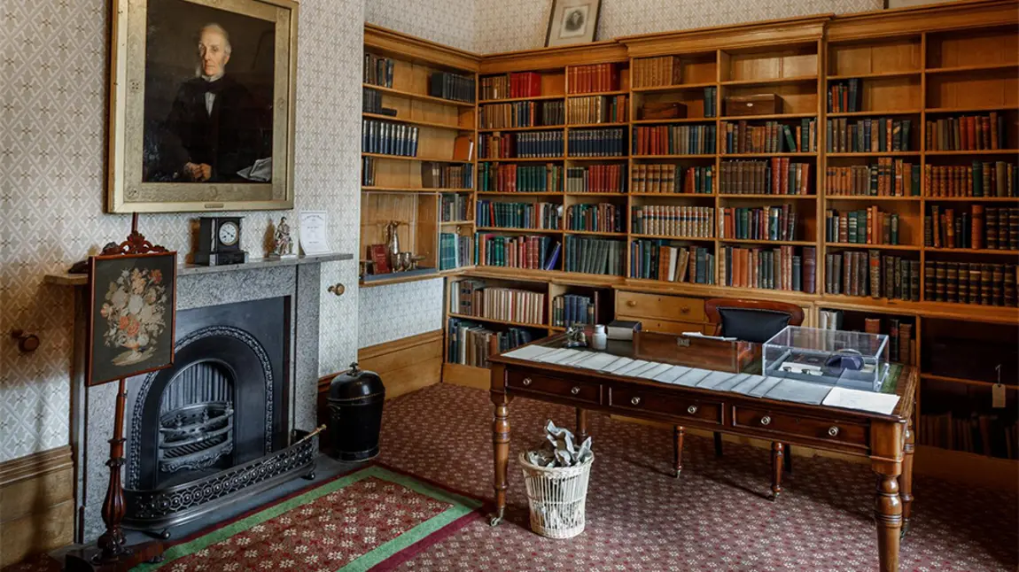 Free virtual backgrounds show off England's stunning heritage Inside a room with desk, book case and fire place in background