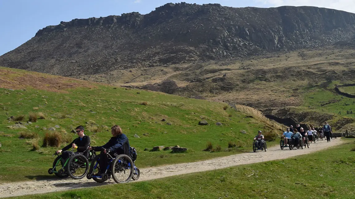 Experience Community CIC wheelchair users enjoying the countryside