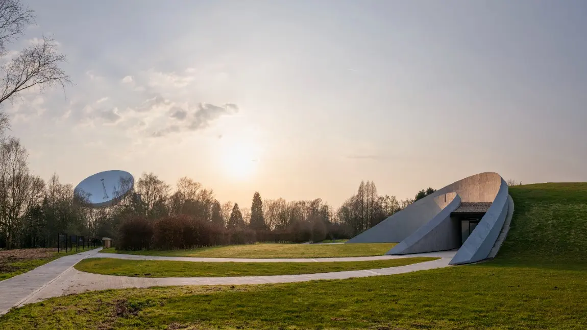 The First Light Pavilion at Jodrell Bank (right had side) with the Lovell telescope in the background (left hand side)