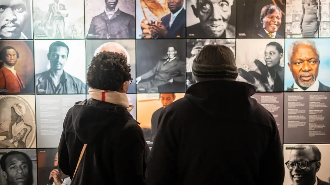 People viewing an exhibition at the International Slavery Museum