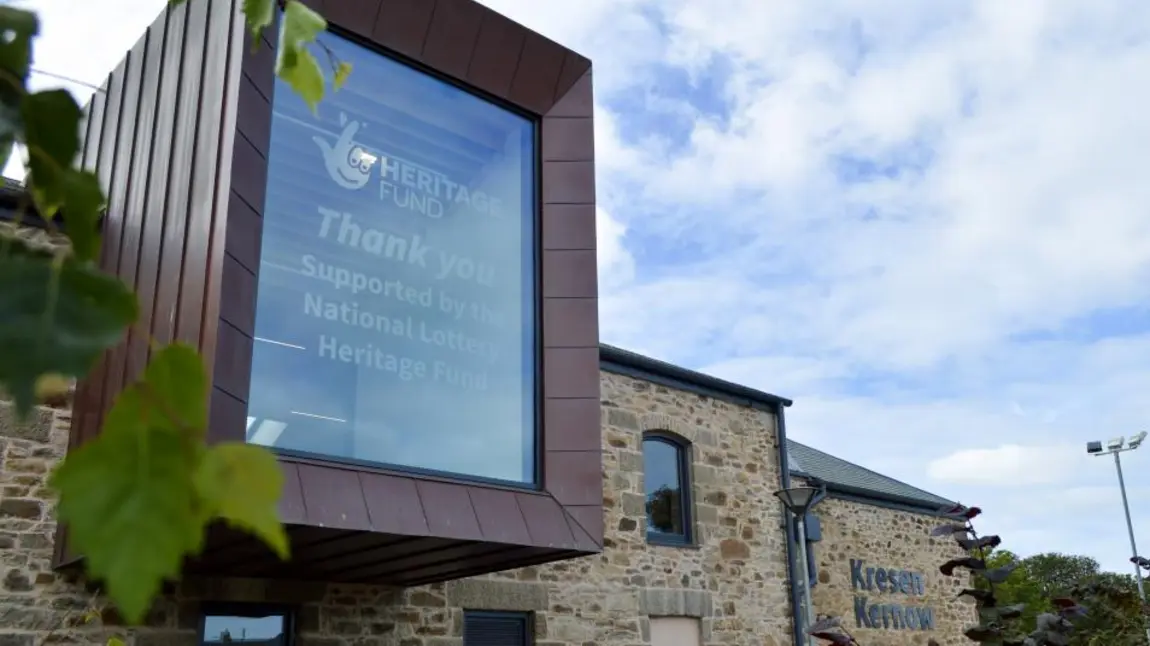 Join our Committees in England and Scotland Window on side of medium sized historic building