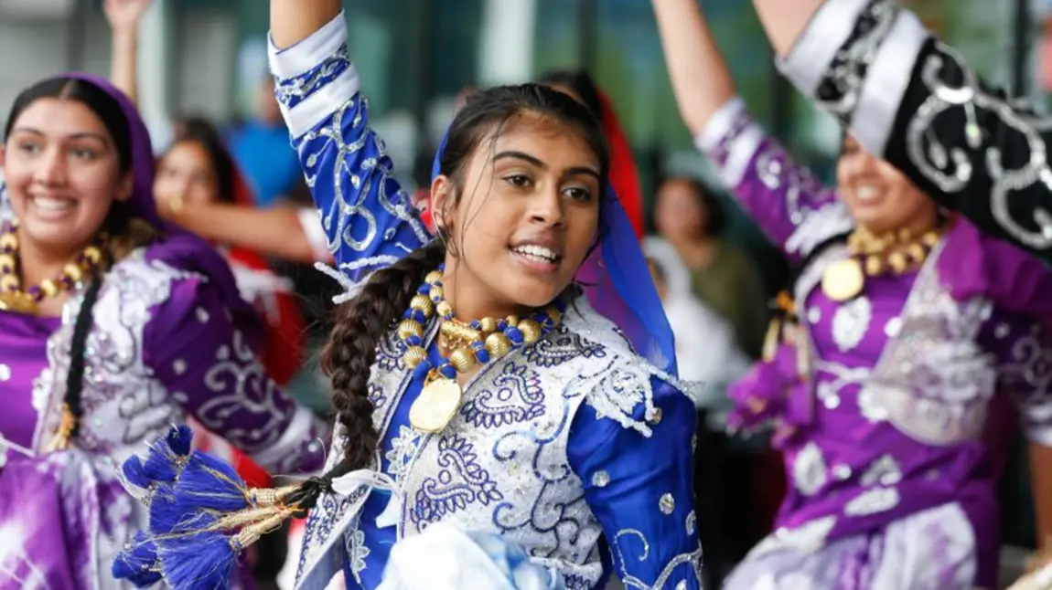 People dancing as part of a cultural festival at the Birmingham Commonwealth games