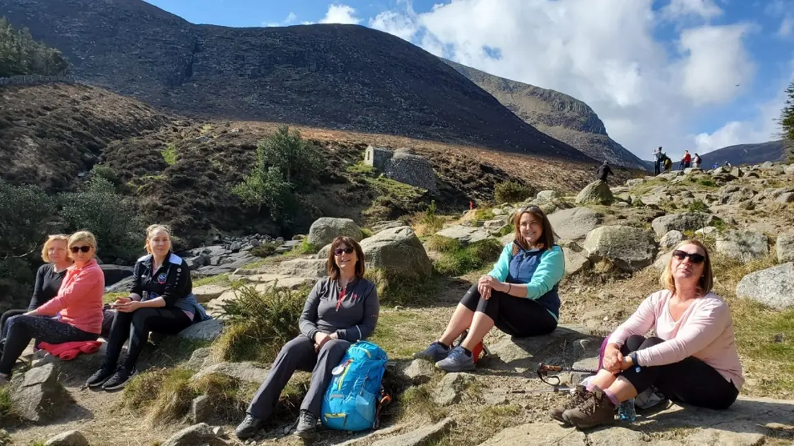 NHS nurses sitting down with Slieve Donard in the background