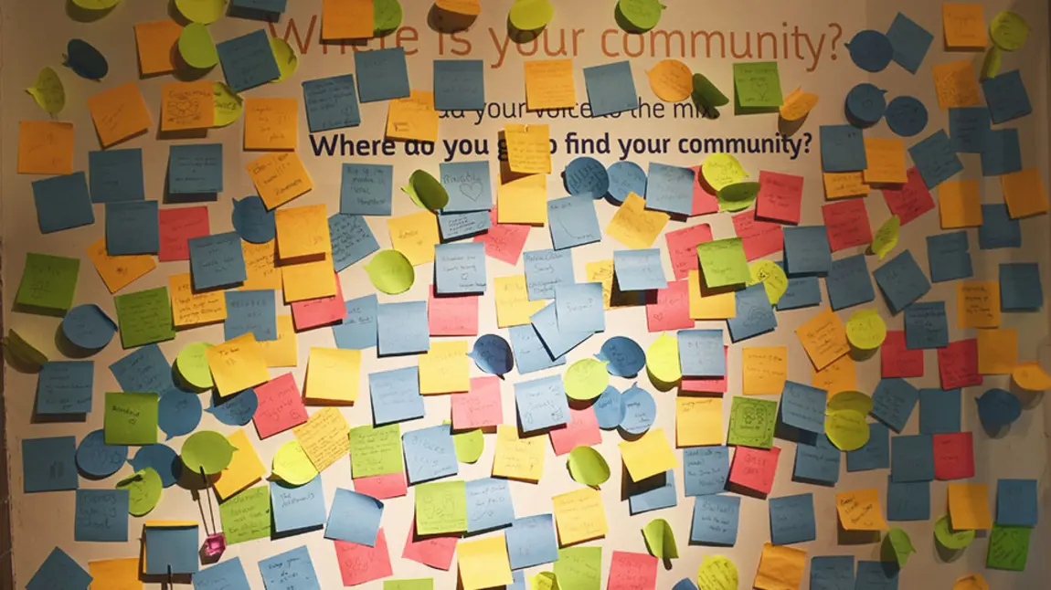 Museum of Oxford's Queering Spires exhibiton. Display post it notes with comments and memories from visitors.