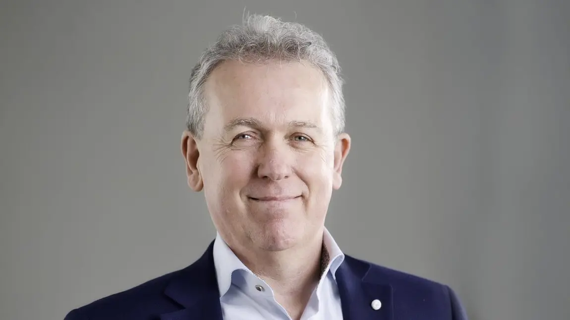 Dr Paul Mullan Person smiling at camera