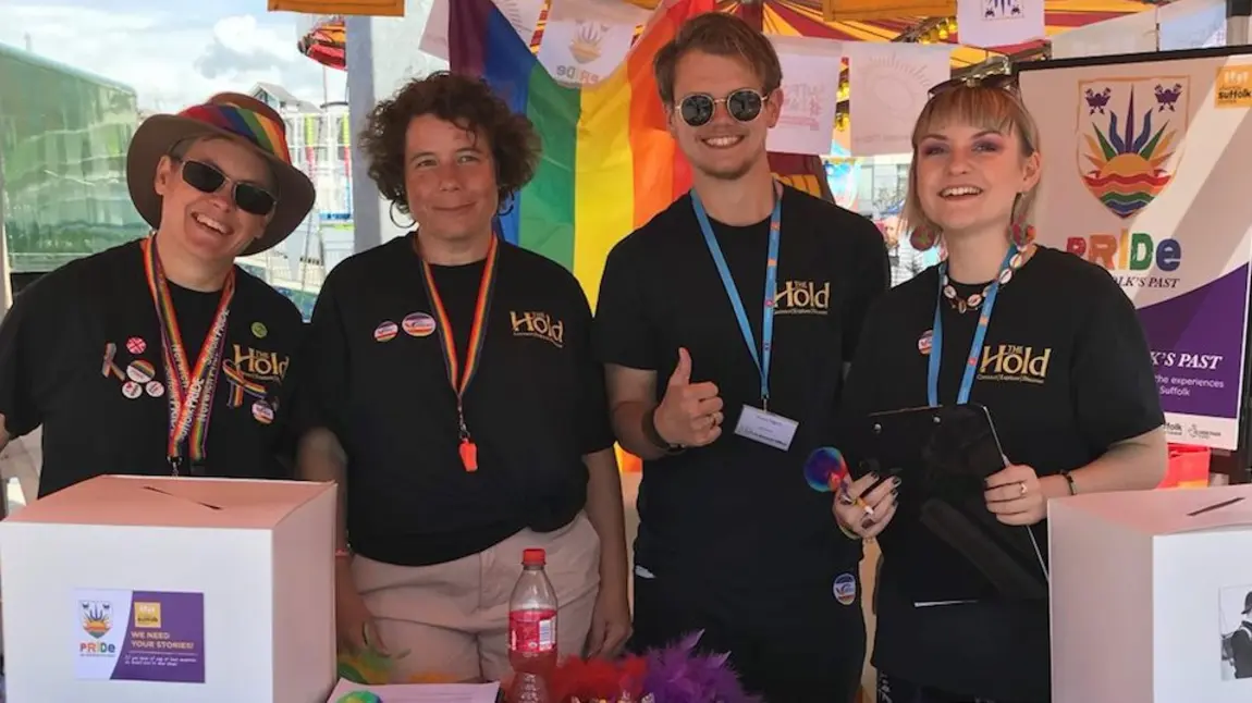 The Hold volunteers at their stand at Suffolk Pride