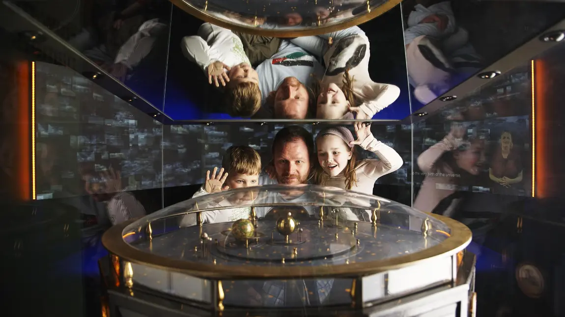 Hello from the new-look National Lottery Heritage Fund! People looking in a mirror