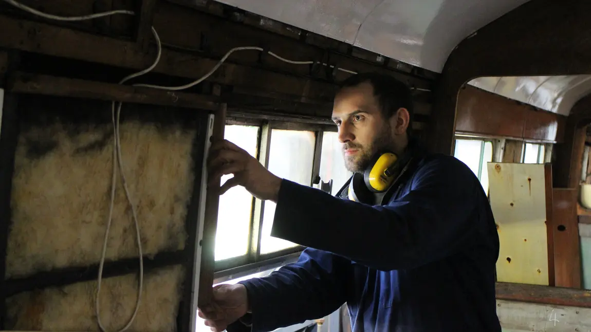 Alex Luckham working on a steam train