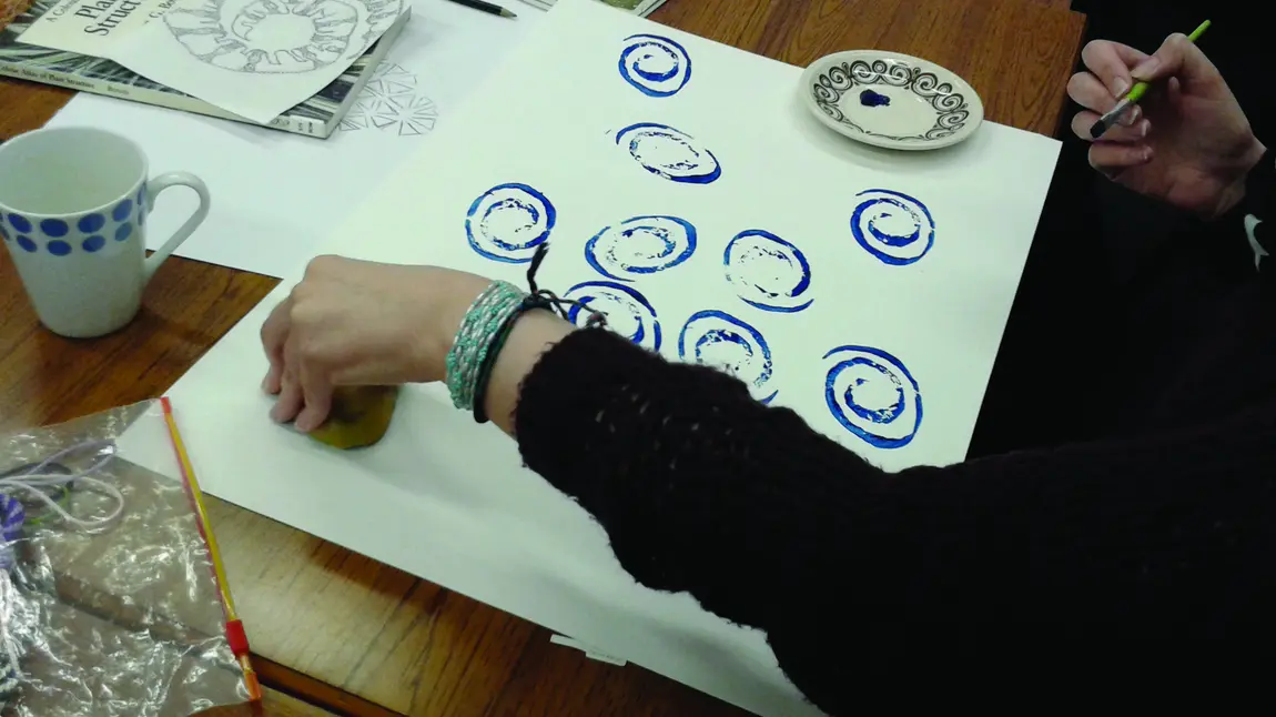 5 ways museums can improve your mental health and wellbeing Person painting