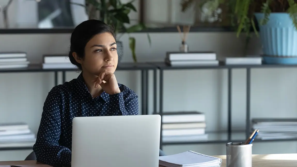 title Young woman with computer
