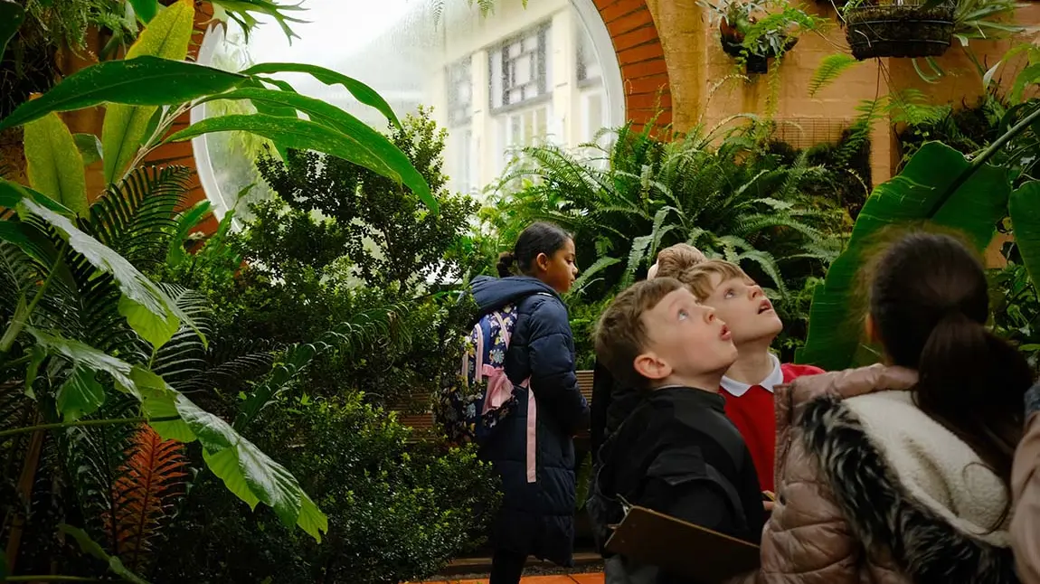 School children visit the greenhouses at Birmingham Botanic Garden