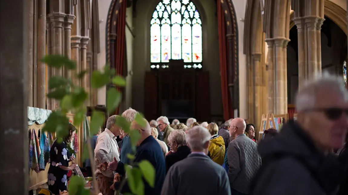 People look at stalls at a craft fair inside St Peter's Sudbury