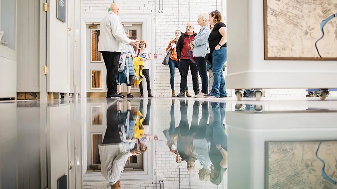 A guide leads a tour inside Templemore Baths