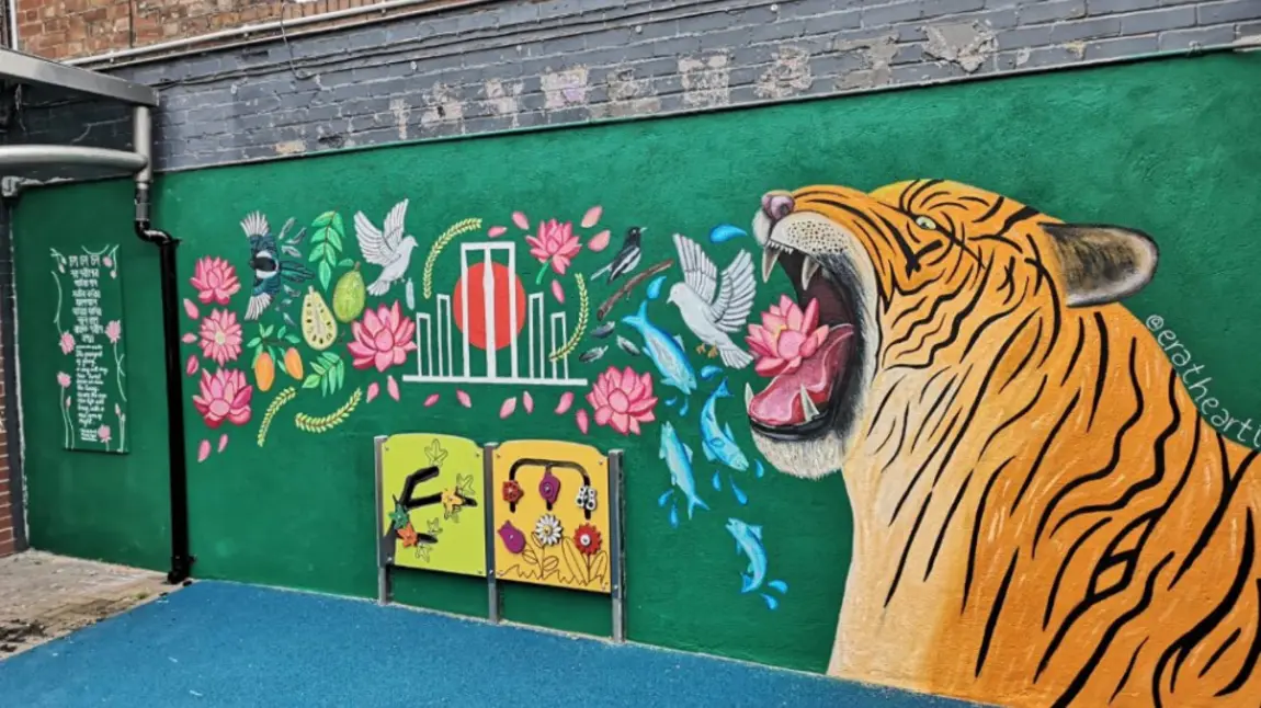 Photograph of a colourful wall mural featuring a tiger