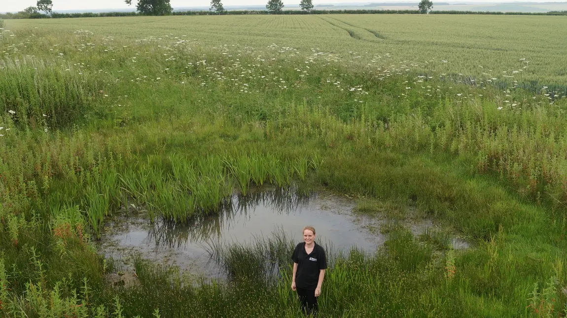 Project officer Emily McGregor at one of the dew ponds