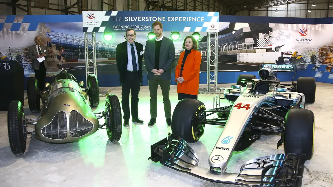 Prince Harry turns the start lights green with HLF's Sir Peter Luff and Silverstone's Sally Reynolds