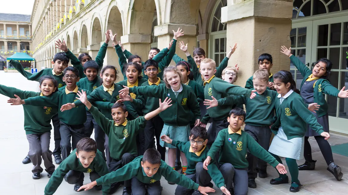 Help to recreate history at the Piece Hall’s Big Sing! Photograph of children who will be taking part in The Big Sing, The Piece Hall, Halifax