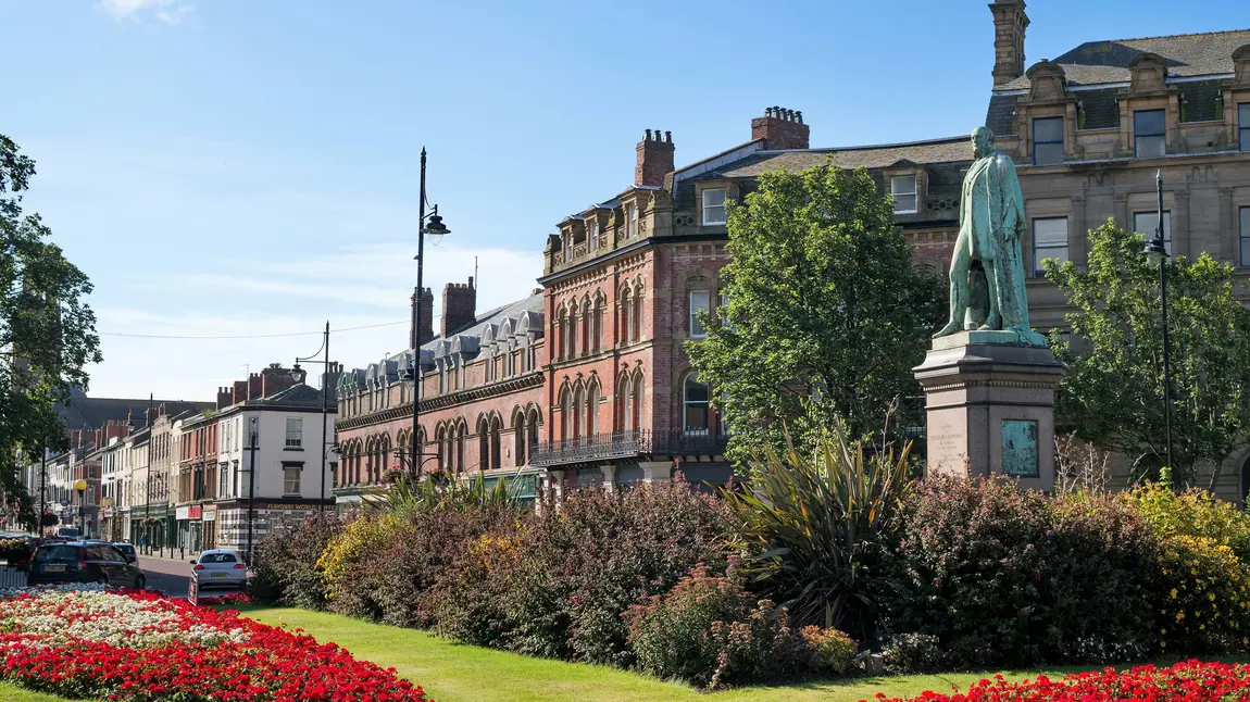 A new way to explore Barrow’s heritage, thanks to National Lottery players. Photograph of Ramsden Square statue and Abbey Road Barrow-in-Furness, Cumbria, England, UK