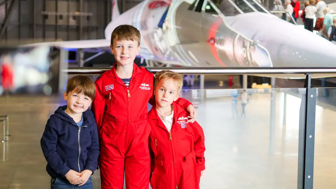 Children standing in front of Concorde