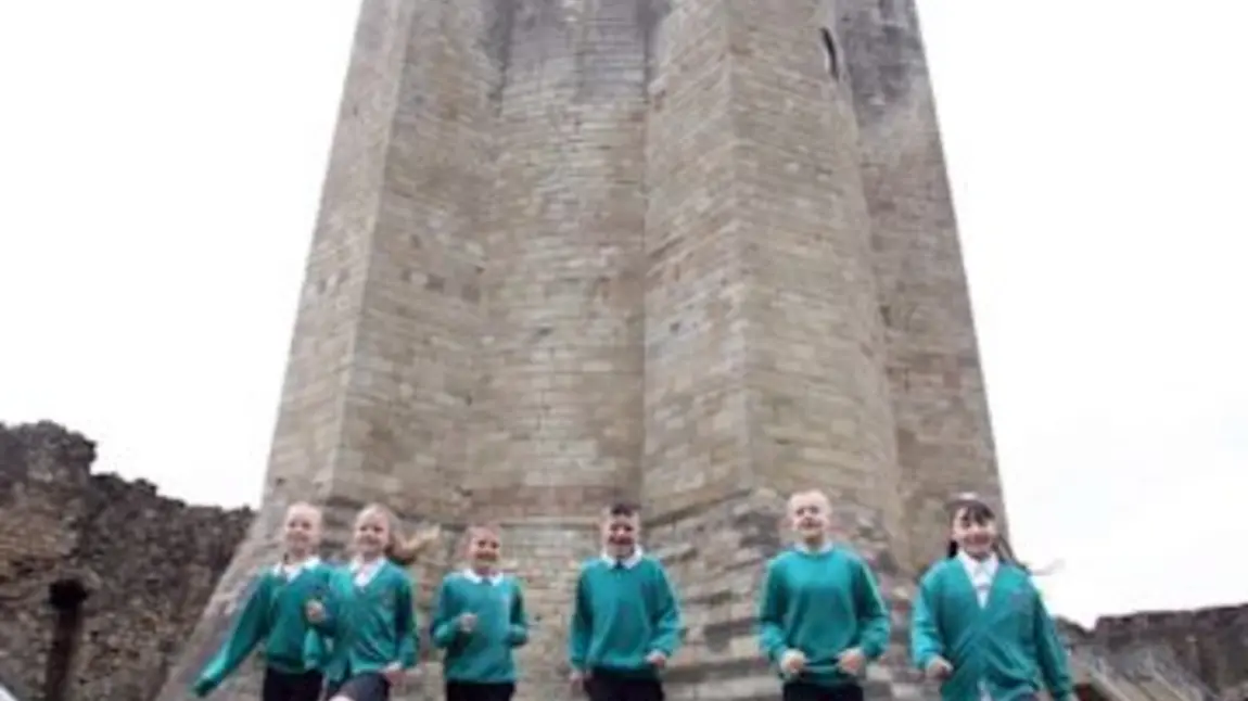 Pupils from Morley Place Junior School help celebrate the reopening of the revamped Conisbrough Castle. Photo Kippa Matthews