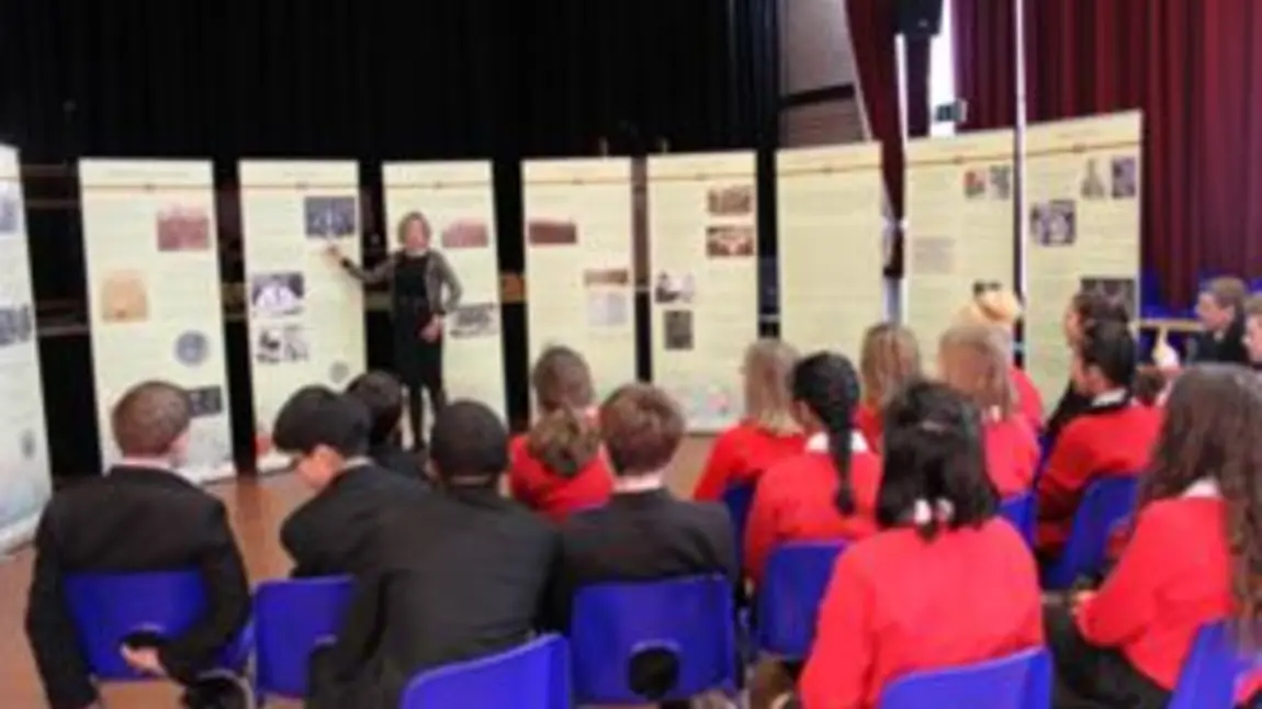 Children attend an event at Dame Alice Owen's School