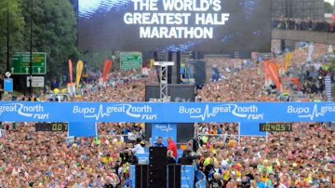 Runners grouped at the start of the race