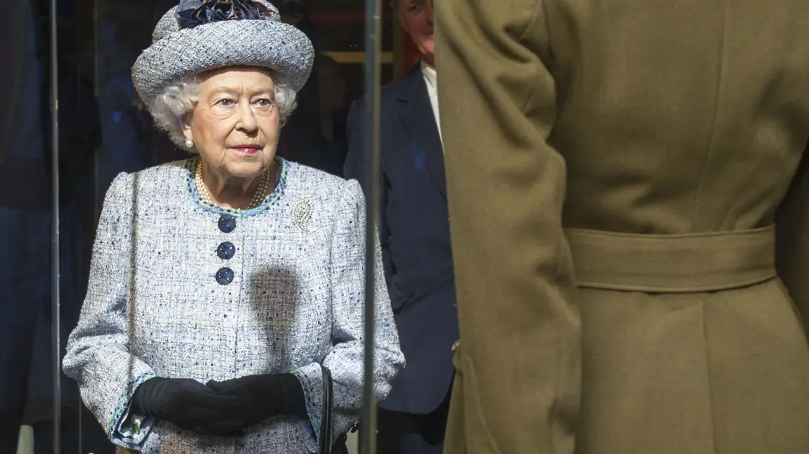 Her Majesty the Queen views her uniform, worn as an Honorary Brigadier in the Women's Royal Army Corps, in the National Army Museum