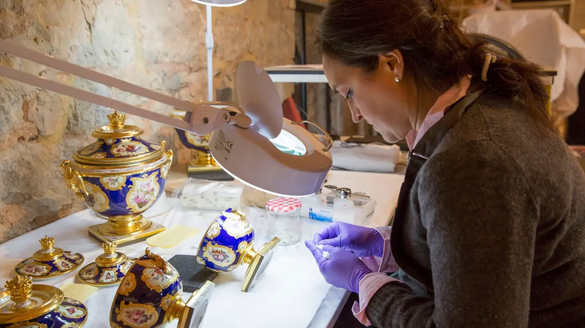 Conservationist at work in Knole's conservation studio 