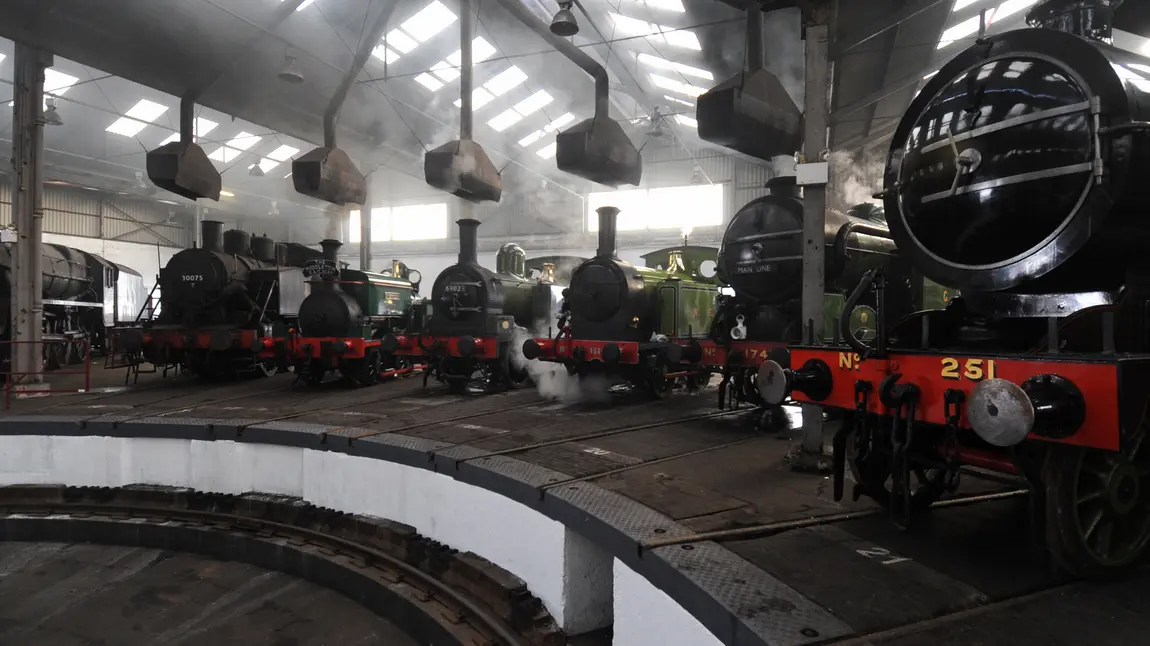 Locomotives line up inside the Barrow Hill Roundhouse